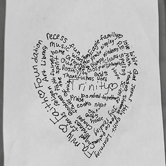 Student's hand-written poem in the shape of a heart